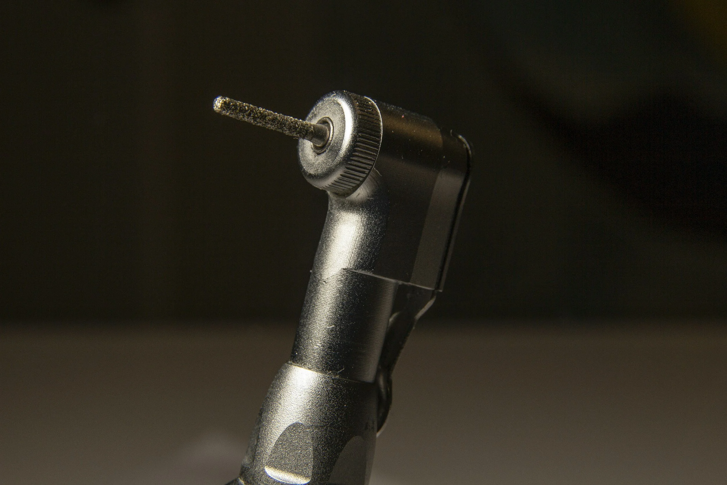 Close-up detail of a dental handpiece